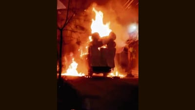 The truck engulfed in flames in Ludhiana’s Sundar Nagar on Sunday. Officials say preliminary probe suggests possible short circuit in overhead power lines led to the fire. (HT Photo) The truck engulfed in flames in Ludhiana’s Sundar Nagar on Sunday. Officials say preliminary probe suggests possible short circuit in overhead power lines led to the fire. (HT Photo)