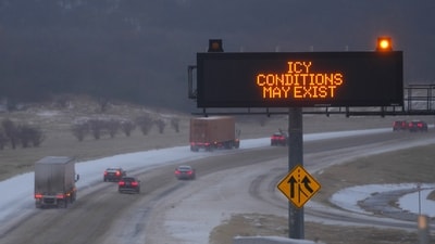 Vehicles travel eastbound on Interstate-20 near a sign advising motorists of possible icy conditions during a winter storm Saturday, Jan. 24, 2026, in Dallas. (AP Photo/Julio Cortez) (AP) Vehicles travel eastbound on Interstate-20 near a sign advising motorists of possible icy conditions during a winter storm Saturday, Jan. 24, 2026, in Dallas. (AP Photo/Julio Cortez) (AP)