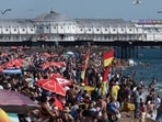 Crowds relax on the beach, during hot weather on Summer bank holiday, in Brighton, Britain, on August 25 (REUTERS)