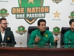 File image of Pakistan Cricket Board's Director High Performance Aqib Javed, center, attends a press conference with T20 team captain Salman Ali Agha and head coach Michael Hesson. (AP)