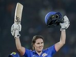 Mumbai Indians' Nat Sciver-Brunt celebrates her century during the Women's Premier League match against Royal Challengers Bengaluru. (BCCI)