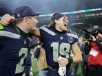 Seattle Seahawks wide receiver Jake Bobo (19) celebrates with quarterback Drew Lock (2) after the NFC Championship 