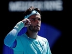 Italy's Lorenzo Musetti celebrates after winning his fourth round match against Taylor Fritz of the U.S.