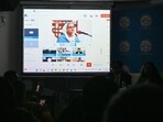 Bangladesh's former prime minister Sheikh Hasina delivers a speech via an audio played by panelists in Delhi on Friday.
