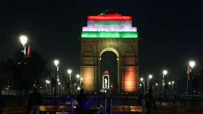Gram it: India Gate illuminates in Tricolour lights, marking the celebrations of 77th Republic Day, Other significant buildings in the vicinity were also lit up, and made for a sight to behold! (Photo: ANI)
