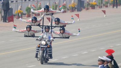 Daredevil soldiers perform a motorcycle stunt during India's Republic Day parade at Kartavya Path in New Delhi on Monday (Raj K Raj/HT Photo)