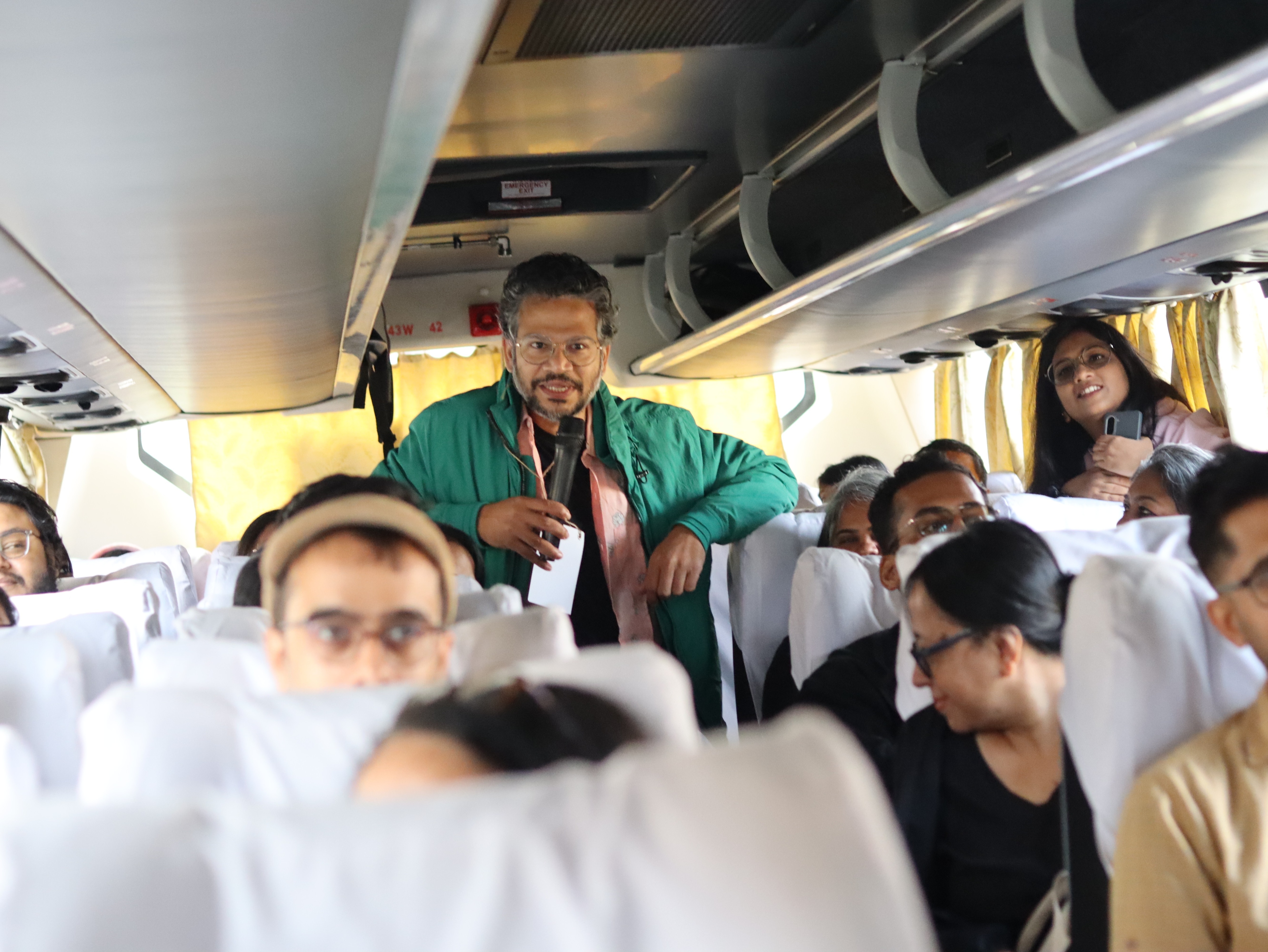 Chandrahas Choudhury addressing participants on the bus (Courtesy Walking Bookfairs) Chandrahas Choudhury addressing participants on the bus (Courtesy Walking Bookfairs)