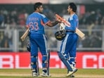 Abhishek Sharma (R) and captain Suryakumar Yadav celebrate India's win at the end of the third T20I against ew Zealand in Guwahati
