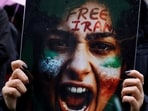 A person holds a placard during a demonstration in support of nationwide protests in Iran, in Dublin, Ireland, January 24, 2026. 