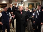 U.S. President Donald Trump answers questions from members of the press about Alex Pretti as he visits the Machine Shed restaurant on January 27, 2026 in Urbandale, Iowa. 