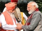 Sant Niranjan Dass, head of Dera Sachkhand, Ballan (Jalandhar), and others meeting PM Narendra Modi on December 5, to extend an invitation.  