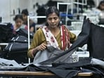 A woman working at a textile unit in India