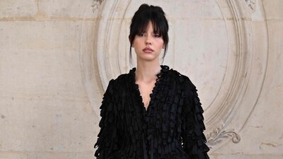 British actor Mia Goth, a brand ambassador for the French label, wore a black look for the Dior show. She also sported grey bottoms. (AFP) British actor Mia Goth, a brand ambassador for the French label, wore a black look for the Dior show. She also sported grey bottoms. (AFP)