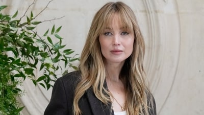 Jennifer Lawrence poses for photographers at the Christian Dior Spring/Summer 2026 Haute Couture collection show in Paris on January. She wore a simple blue jeans look. (AP) Jennifer Lawrence poses for photographers at the Christian Dior Spring/Summer 2026 Haute Couture collection show in Paris on January. She wore a simple blue jeans look. (AP)