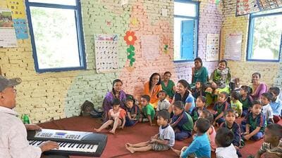 Nepalese students sing a song in the classroom of a school in Bhaktapur on the outskirts of Kathmandu. (AFP Photo)