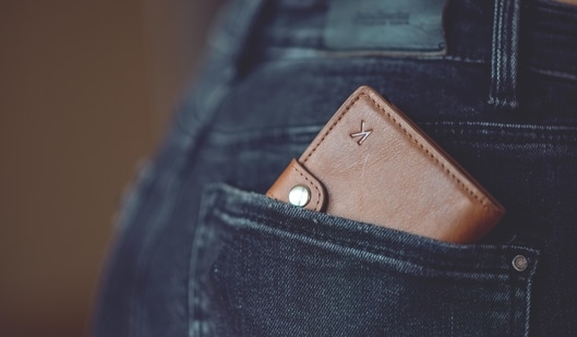 Keep your cash and cards safe with stylish men’s wallets. (Pexels)