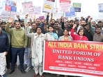Bank employees staging a protest in Prayagraj on Tuesday (HT)