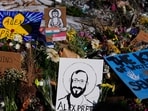 A drawing of Alex Pretti is displayed at the scene where he was fatally shot by a U.S. Border Patrol officer over the weekend, Tuesday, Jan. 27, 2026, in Minneapolis. (AP Photo/Julia Demaree Nikhinson)