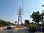 Latest crash injured a truck driver, while agencies dispute responsibility and HVPNL says relocation depends on government funding. (Parveen Kumar/HT)