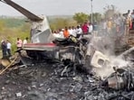Firefighters at the site after an aircraft carrying Maharashtra Deputy Chief Minister Ajit Pawar crashed during landing, at Baramati in Pune district, Maharashtra, Wednesday, Jan. 28, 2026. 