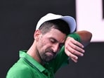 Serbia's Novak Djokovic reacts on a point against Italy's Lorenzo Musetti during their men's singles quarter-final match on day eleven of the Australian Open tennis tournament in Melbourne Serbia's Novak Djokovic reacts on a point against Italy's Lorenzo Musetti during their men's singles quarter-final match on day eleven of the Australian Open tennis tournament in Melbourne