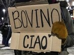 A demonstrator displays a sign during a protest in Minneapolis, Minnesota, U.S., January 26, 2026.