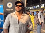 Varun Dhawan posed at a train station in Mumbai.