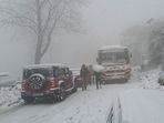Vehicles stuck on a snow-covered road during heavy snowfall at Fagu near Kufri in Shimla on Tuesday. (Deepak Sansta) Vehicles stuck on a snow-covered road during heavy snowfall at Fagu near Kufri in Shimla on Tuesday. (Deepak Sansta)