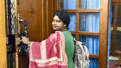 Roshan Khatoon, a housekeeper, has just finished her evening work in a central Delhi household, and is getting ready to leave for home. With an umbrella and pithu bag in hand, she patiently agrees to become a part of our Proust Questionnaire series. (HT Photo) Roshan Khatoon, a housekeeper, has just finished her evening work in a central Delhi household, and is getting ready to leave for home. With an umbrella and pithu bag in hand, she patiently agrees to become a part of our Proust Questionnaire series. (HT Photo)