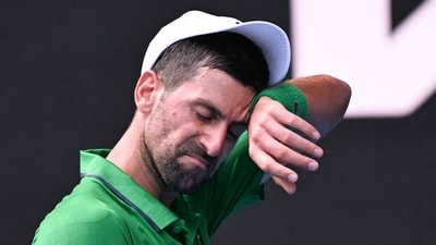 Serbia's Novak Djokovic reacts on a point against Italy's Lorenzo Musetti during their men's singles quarter-final match on day eleven of the Australian Open tennis tournament in Melbourne (AFP) Serbia's Novak Djokovic reacts on a point against Italy's Lorenzo Musetti during their men's singles quarter-final match on day eleven of the Australian Open tennis tournament in Melbourne (AFP)