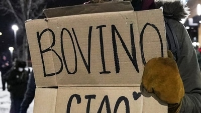 A demonstrator displays a sign during a protest in Minneapolis, Minnesota, U.S., January 26, 2026. (REUTERS)