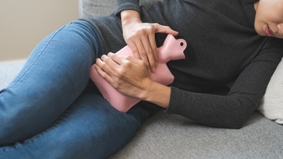 Period pain includes heaviness in the lower abdomen. (Shutterstock) Period pain includes heaviness in the lower abdomen. (Shutterstock)