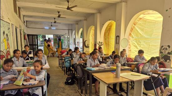 Gurugram, India-July 18, 2025: Students of Government Girls Senior Secondary School (GGSSS) attend classes in the porch area due to a shortage of classrooms, at Bhim Nagar near the Fire Brigade station, in Gurugram, India, on Friday, 18 July 2025. (Photo by Parveen Kumar/Hindustan Times)(Pic to go with Ankur's story)