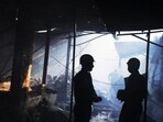 Fire-fighters work to douse a fire at the Hatibagan market in Kolkata. AFP Photo/Dibyangshu Sarkar (Representative photo)