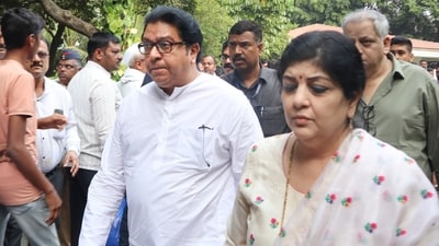 Maharashtra Navnirman Sena (MNS) chief Raj Thackeray and his wife Sharmila Thackeray arrived for Ajit Pawar's funeral in Baramati in Pune district on Thursday. (PTI) Maharashtra Navnirman Sena (MNS) chief Raj Thackeray and his wife Sharmila Thackeray arrived for Ajit Pawar's funeral in Baramati in Pune district on Thursday. (PTI)