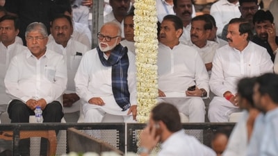 Leading politicians of Maharashtra including Chandrakant Patil, Chhagan Bhujbal, and NCP MP Praful Patel attended the funeral of Ajit Pawar at Vidya Pratishthan ground in Baramati on Thursday. (PTI) Leading politicians of Maharashtra including Chandrakant Patil, Chhagan Bhujbal, and NCP MP Praful Patel attended the funeral of Ajit Pawar at Vidya Pratishthan ground in Baramati on Thursday. (PTI)