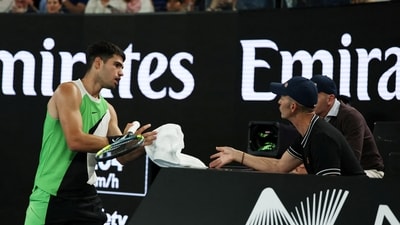Carlos Alcaraz was forced to removed his Whoop wristband during an Australian Open match. (REUTERS)