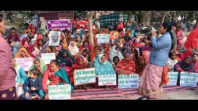Workers from different parts of Varanasi on Thursday staged a protest