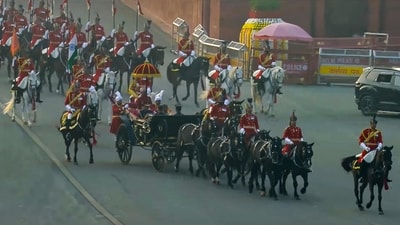 President Droupadi Murmu arriving in a ceremonial carriage escorted by the President's Bodyguard during the Beating Retreat ceremony (PTI) President Droupadi Murmu arriving in a ceremonial carriage escorted by the President's Bodyguard during the Beating Retreat ceremony (PTI)