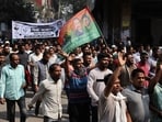 Supporters of Bangladesh Nationalist Party (BNP) chant slogans as they join in an election campaign in Dhaka.