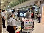 Airport health authorities wearing protective masks monitor passengers from international flights arriving at Suvarnabhumi International Airport in Bangkok, Thailand, January 25, 2026, following the implementation of health screening measures for passengers arriving from West Bengal.