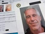 Documents that were included in the U.S. Department of Justice release of the Jeffrey Epstein files are photographed