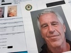Documents that were included in the U.S. Department of Justice release of the Jeffrey Epstein files are photographed on Friday.