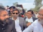 MLA Brijbhushan Singh Rajput (Left) led the protest to draw the minister Swatantra Dev Singh’s (Right) attention to problems being faced by people (Videograb)