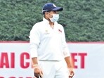 Sarfaraz Khan wears a mask while fielding on the first day of Mumbai's Ranji Trophy match against Delhi at the Sharad Pawar Cricket Academy on Thursday. With the ground situated in a commercial hub and the air getting dusty due to construction work around the complex, many Mumbai players resorted to mask.- Photo by Prakash Parsekar