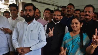Sharmila Pimpolkar Gaikwad of the Shiv Sena filed her nomination papers in presence of Sena chief and deputy chief minister Eknath Shinde, Sena MP Naresh Mhaske, BJP MLA Niranjan Davkhare, and other leaders and office-bearers (Praful Gangurde / HT Photo) Sharmila Pimpolkar Gaikwad of the Shiv Sena filed her nomination papers in presence of Sena chief and deputy chief minister Eknath Shinde, Sena MP Naresh Mhaske, BJP MLA Niranjan Davkhare, and other leaders and office-bearers (Praful Gangurde / HT Photo)
