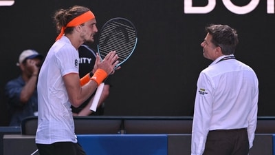 Alexander Zverev voices his frustration to the match supervisor at the Australian Open. (AFP) Alexander Zverev voices his frustration to the match supervisor at the Australian Open. (AFP)