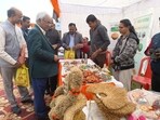 Entrepreneurs displaying their ware at the two-day Kisan Mela in Lucknow on Friday (HT Photo)