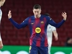 Robert Lewandowski celebrates scoring his team's first goal during the UEFA Champions League.