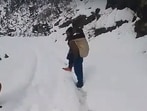 In the tribal Pangi valley of the Bharmaur assembly constituency in Chamba district, a 14-year-old boy from Shoon village had to be carried on the back for nearly 33 km to reach Killar hospital on Friday due to his illness, as roads in the area remained closed following heavy snowfall. (HT Photo)